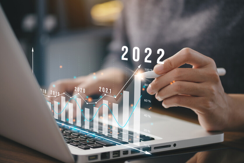 Businessman plan business growth and financial, increase of positive indicators in the year 2022 to increase business growth and an increase for growing up business