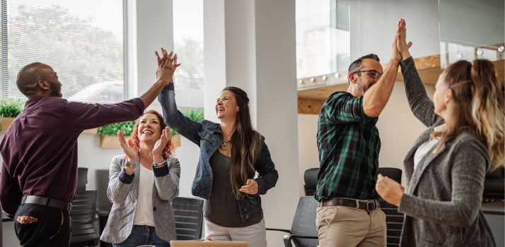 stock image of people high-fiving